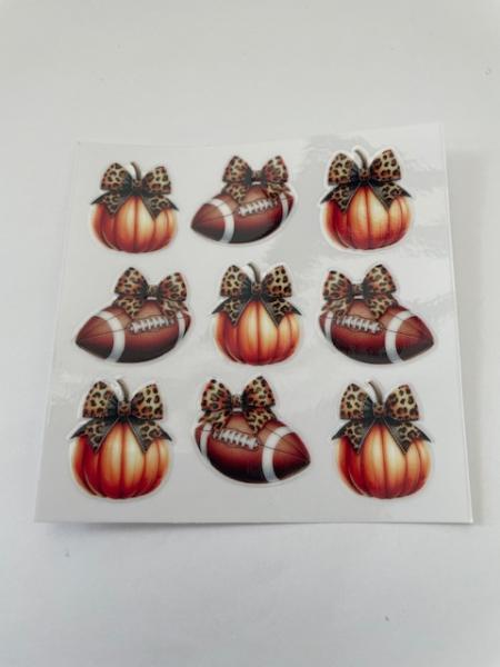 Pumpkins, bows, footballs